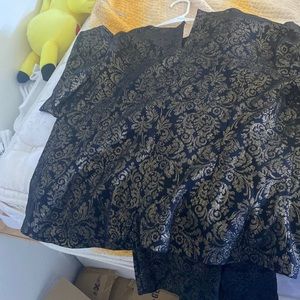 Golden and black top and pants